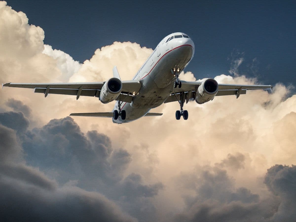 Commercial aircraft representing corporate and leisure travel arrangements